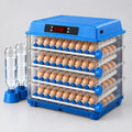 Ovatekly Farm, the 300-egg automatic incubator, four loaded trays, studio photograph on a light background